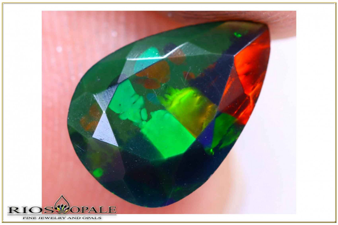 Drop cut faceted Welo opal - smoked - 1,17ct