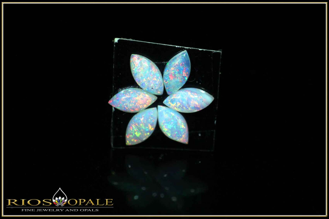 6 pieces fiery Coober Pedy full opal cabochon navettes - calibrated - 0,96ct