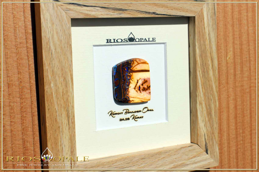 Koroit Boulder Opal - 24,28ct - Silver Edition in 12x12cm beech stoked wooden frame