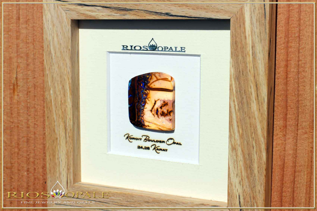 Koroit Boulder Opal - 24,28ct - Silver Edition in 12x12cm beech stoked wooden frame